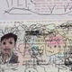 Illustration for article titled Father Detained in South Korea Over Son's Adorable Passport Drawings